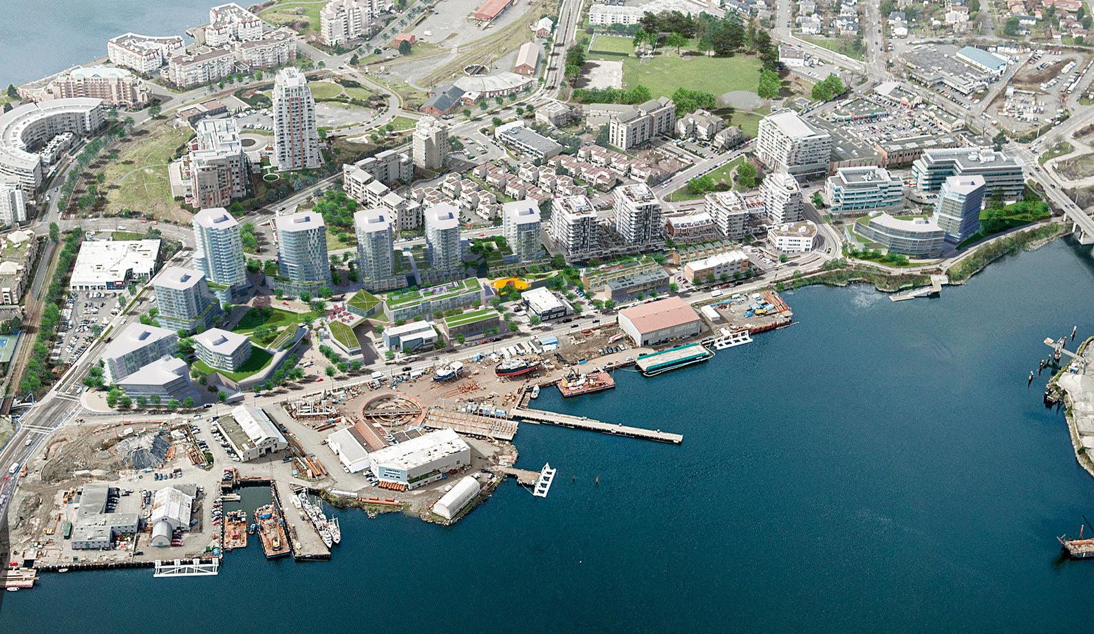 Birds-eye-view of docks and buildings along the ocean