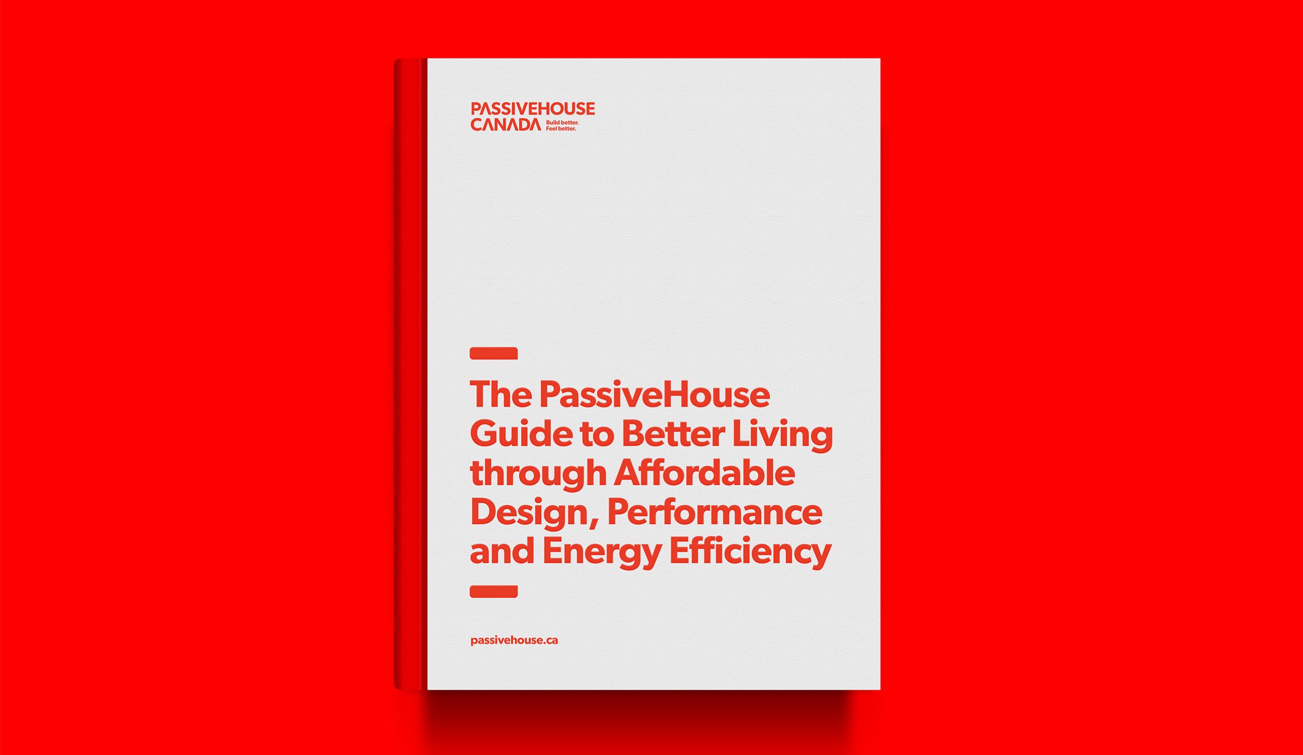 A white book with red text that says "The PassiveHouse Guide to Better Living through Affordable Design, Performance and Energy Efficiency"