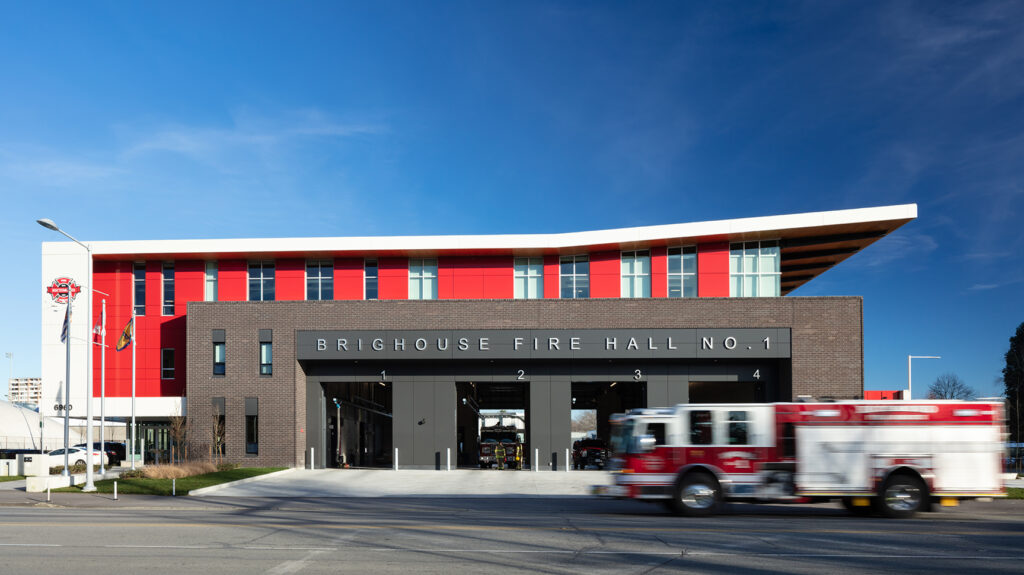 Firehall building from front. Red wall and angled roof