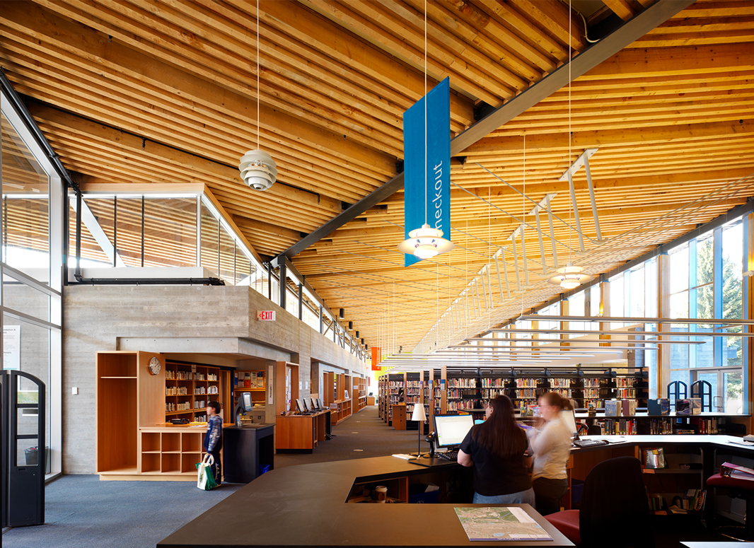 Interior of library, showing off the wooden roof.