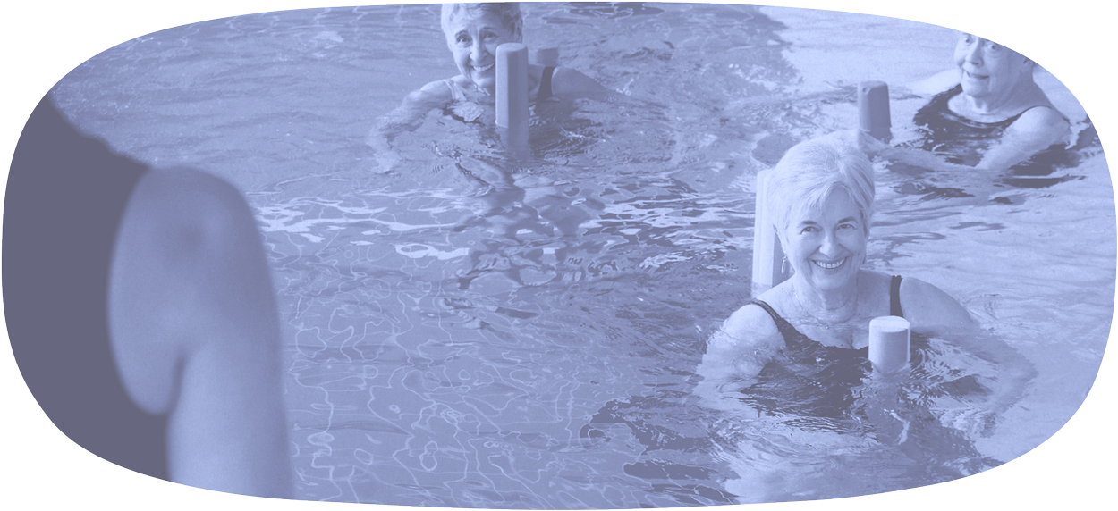A stylized still shot from The Space Between short film: Post Polio. A woman participating in a pool aqua-cise workout designed for Polio survivors.