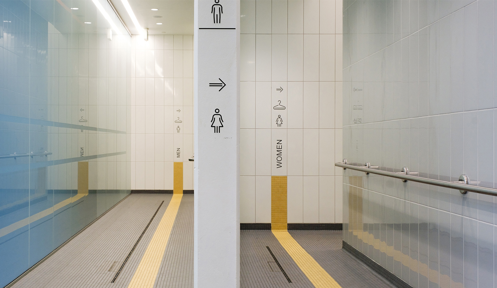 Signage and iconography for the gendered changerooms within the facility.